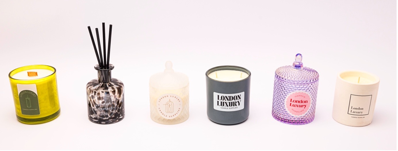 A series of candles in different jars, all with alternative branding on. 