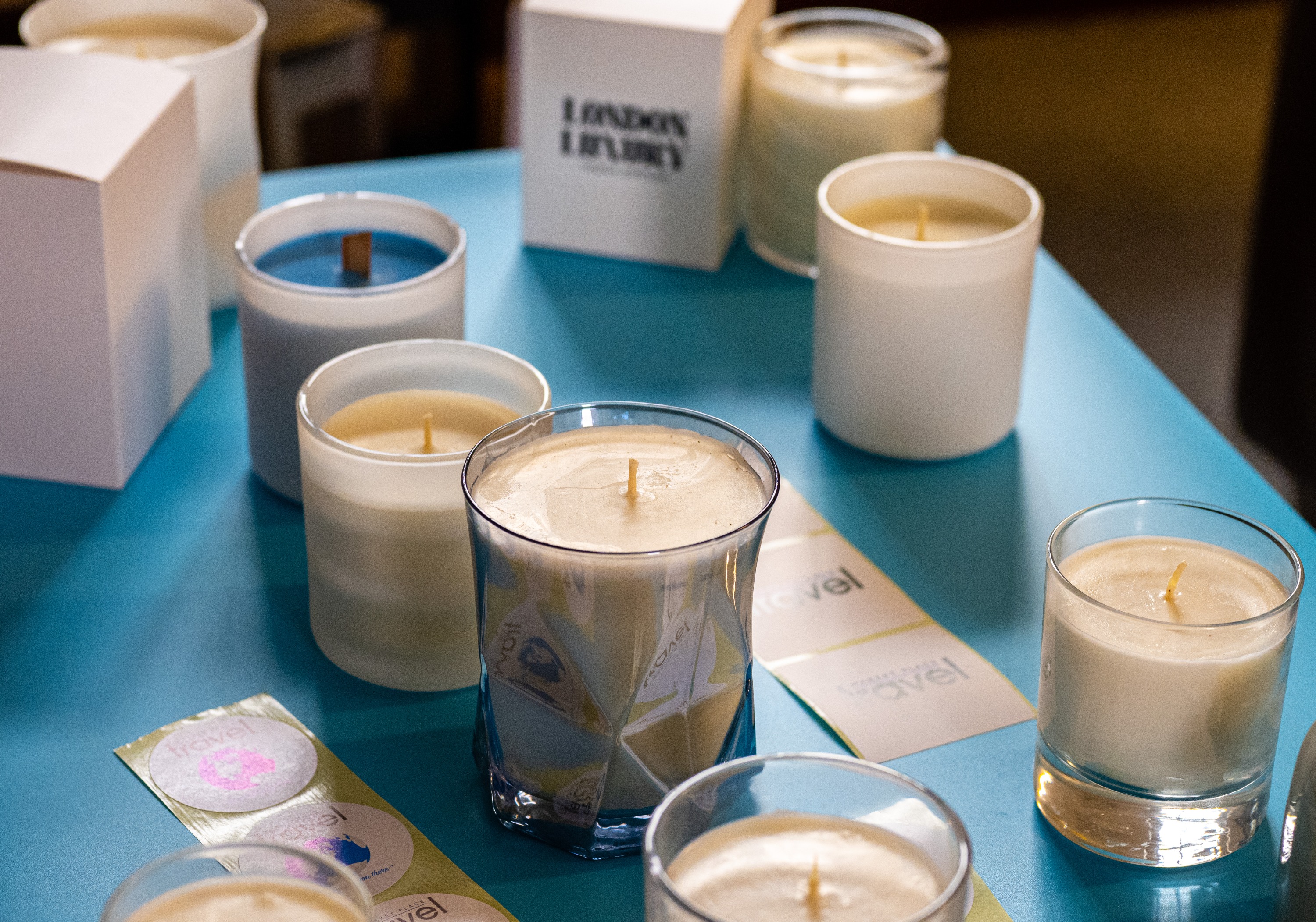 Varied selection of candles and labelling.